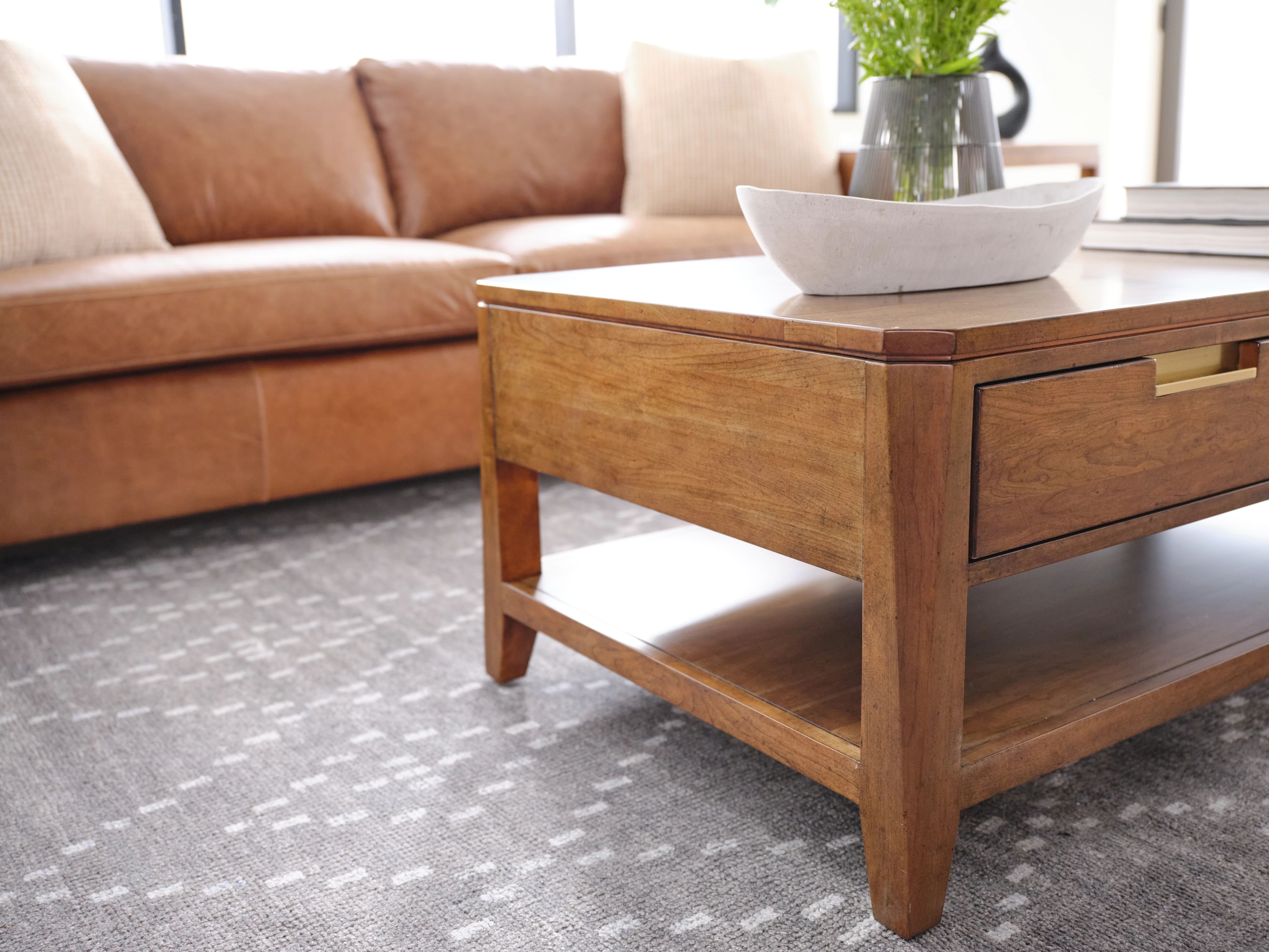 complimentary accents with a brown leather sofa
