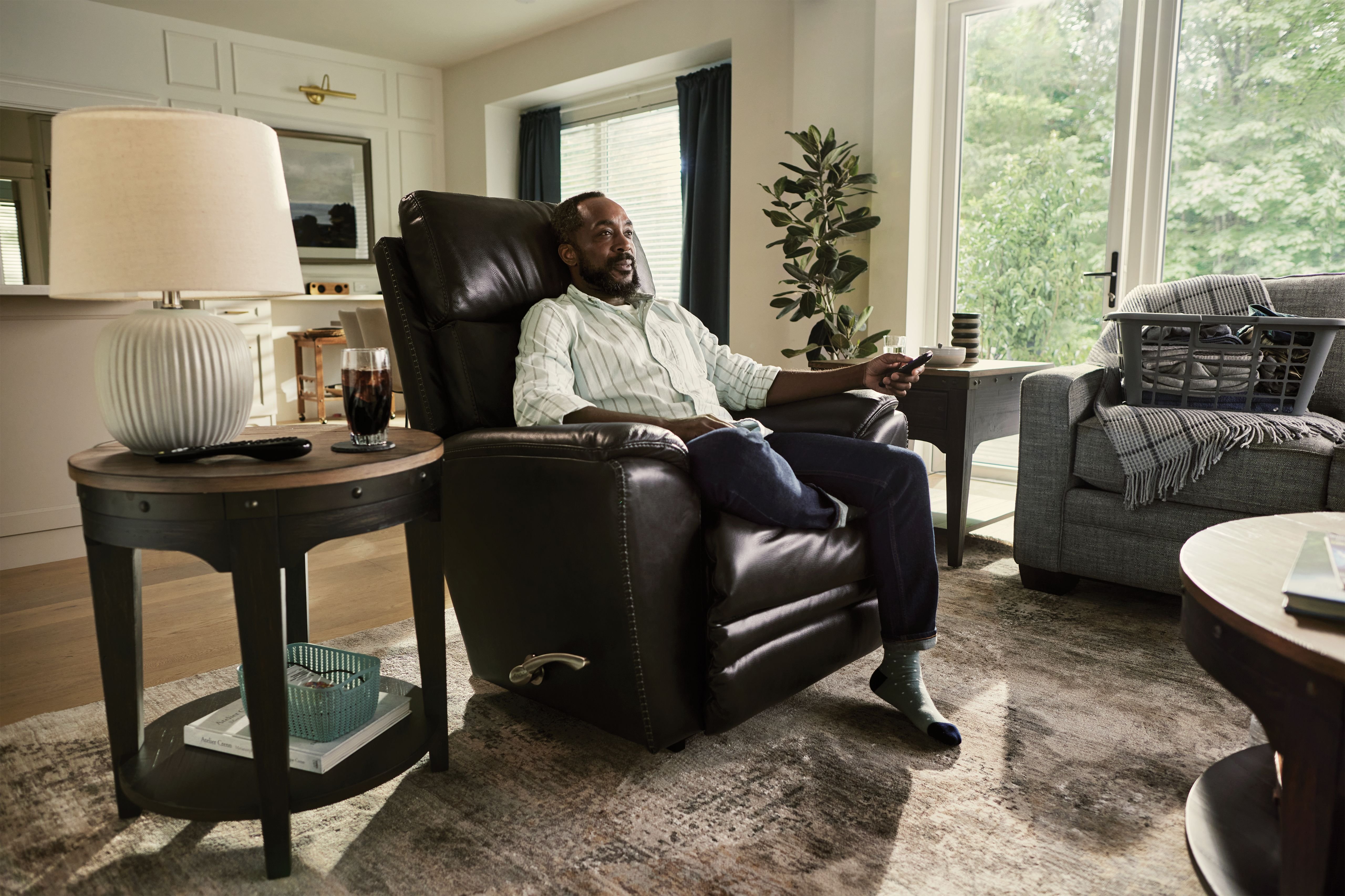 man resting in a la-z-boy recliner chair