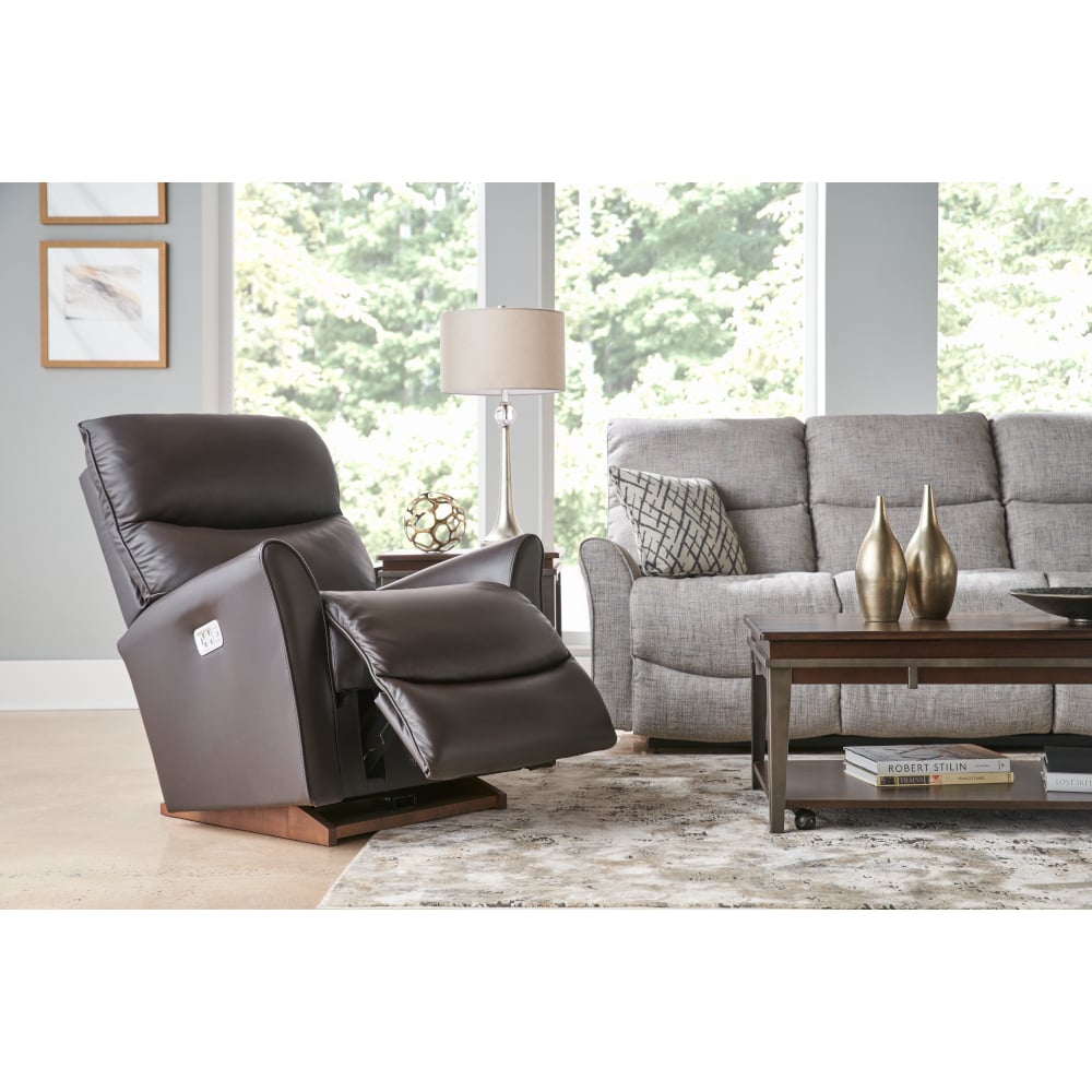 brown leather power recliner and gray power reclining sofa