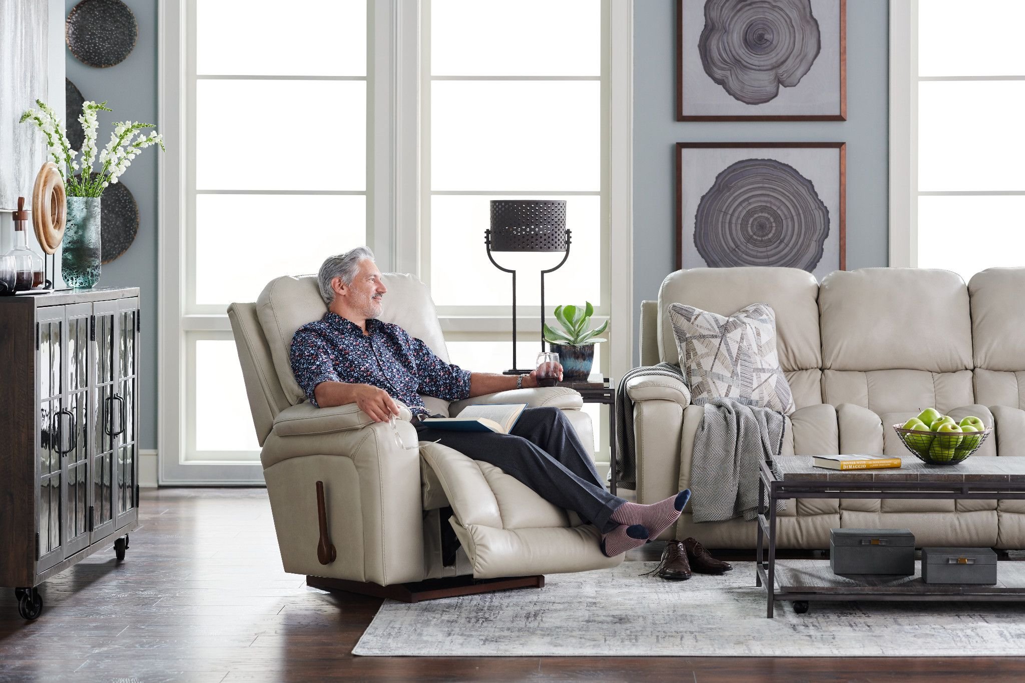 man sitting in recliner chair in living room